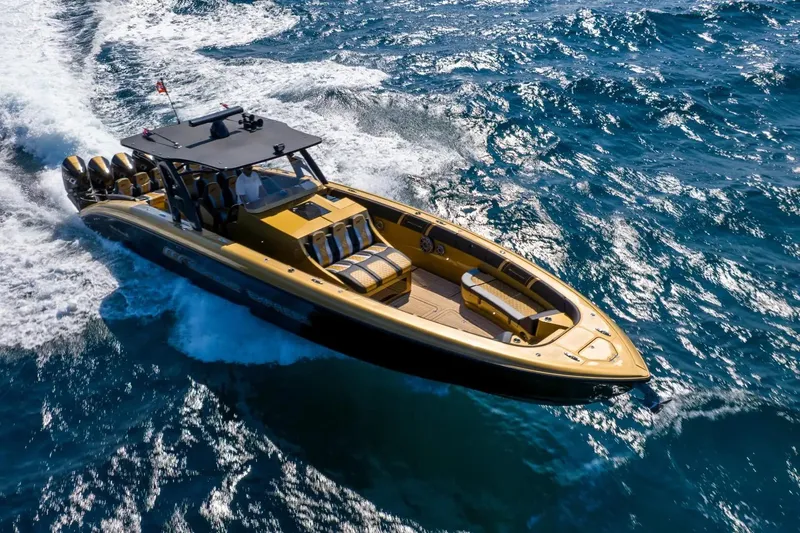 Slide: The Image of 2023 Midnight Express 43 Open boat cruising on ocean waves. - 2