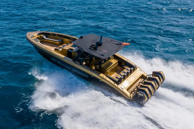 Slide: The Image of 2023 Midnight Express 43 Open boat cruising on blue ocean waters. - 3