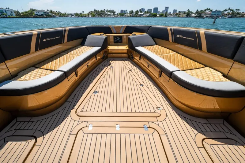 Slide: The Image of Luxurious interior of 2023 Midnight Express 43 Open boat with elegant seating and wood finish. - 5