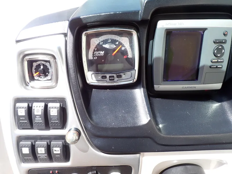 Slide: The Image of Dashboard of 2011 Chaparral 287 SSX with gauges and Garmin GPS. - 14