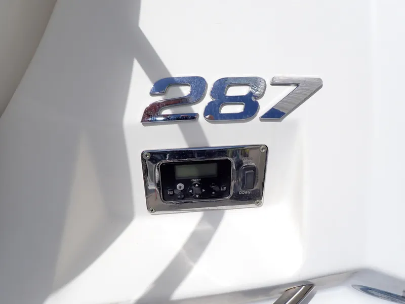 Slide: The Image of 2011 Chaparral 287 SSX boat detail with control panel and model number. - 23
