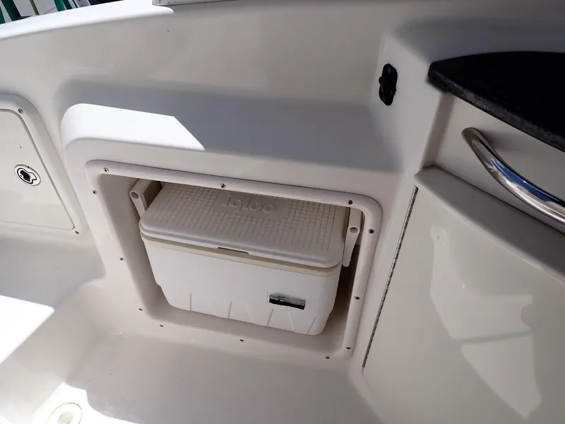 Slide: The Image of Built-in cooler compartment on 2011 Chaparral 287 SSX boat. - 28