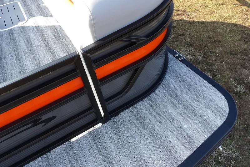Slide: The Image of 2026 Bennington 22 SSR pontoon boat with sleek design and vibrant orange accents. - 10