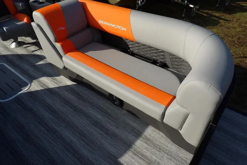 Slide: The Image of 2026 Bennington 22 SSR boat seat with gray and orange upholstery. - 11
