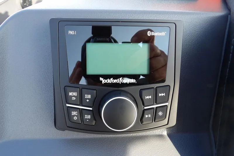 Slide: The Image of Rockford Fosgate PMX-1 audio system in 2026 Bennington 22 SSR boat dashboard. - 21
