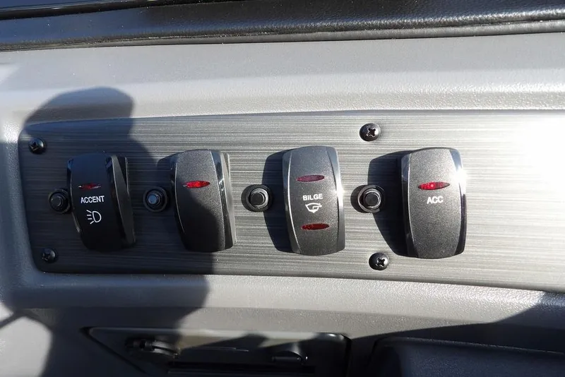 Slide: The Image of Control panel of 2026 Bennington 22 SSR boat with accent, bilge, and accessory switches. - 25