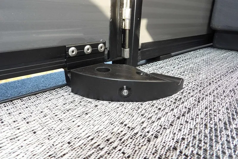 Slide: The Image of 2026 Bennington 22 SSR boat hinge detail on textured flooring. - 36