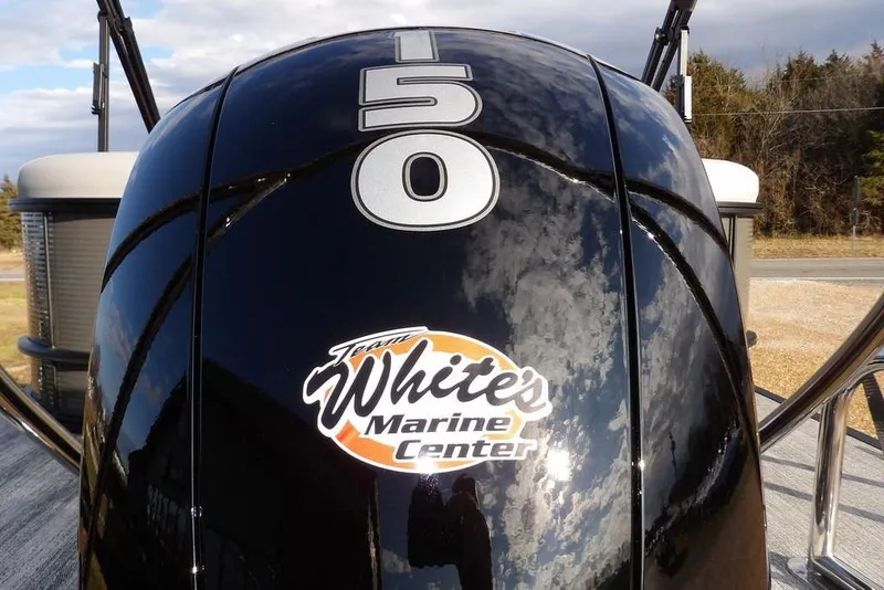 Slide: The Image of Close-up of a 2026 Bennington 22 SSR boat engine with "150" and "White's Marine Center" logo. - 37