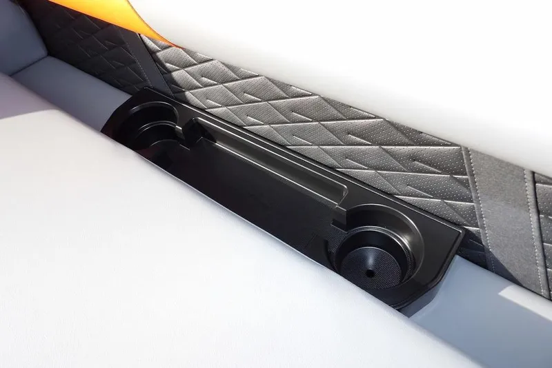 Slide: The Image of 2026 Bennington 22 SSR interior with quilted upholstery and integrated cup holders. - 39