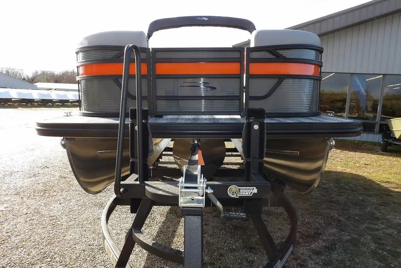 Slide: The Image of 2026 Bennington 22 SSR pontoon boat on trailer, front view, outdoors. - 4