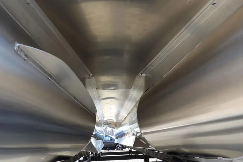 Slide: The Image of Underneath view of 2026 Bennington 22 SSR pontoon boat, showcasing sleek aluminum pontoons. - 41