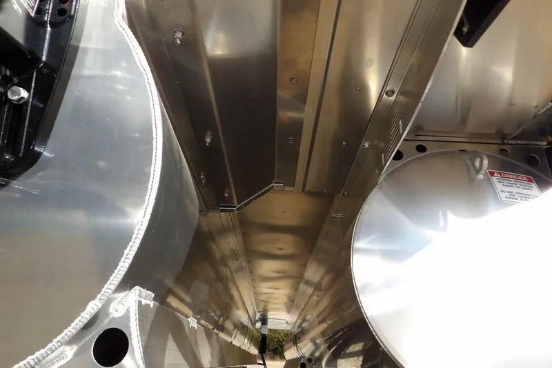 Slide: The Image of Interior view of a 2026 Bennington 22 SSR pontoon boat, showcasing metallic components. - 45