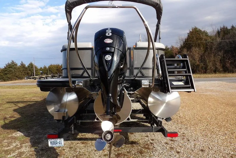 Slide: The Image of 2026 Bennington 22 SSR pontoon boat rear view with outboard motor. - 8