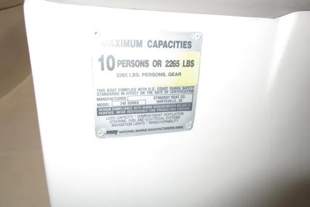 Slide: The Image of 2004 Stingray 240 LR capacity plate, maximum 10 persons or 2265 lbs. - 19
