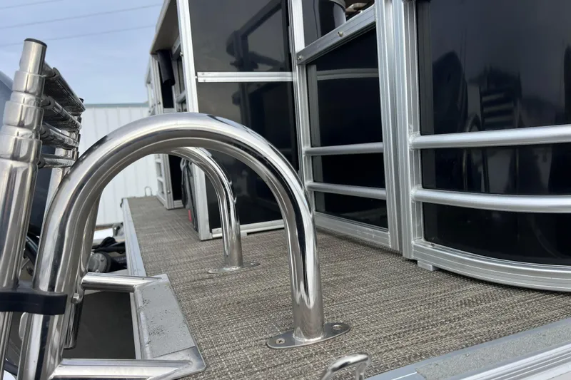 Slide: The Image of 2019 SunChaser Geneva Fish 20 Cnf pontoon boat with stainless steel railings and deck. - 18