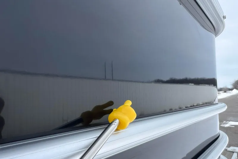 Slide: The Image of 2019 SunChaser Geneva Fish 20 Cnf boat with a yellow duck decoration. - 19