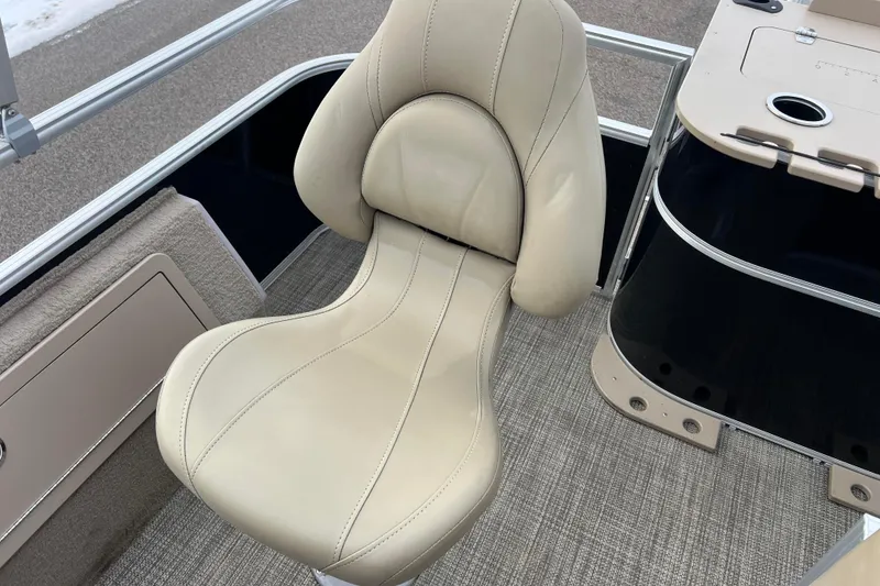 Slide: The Image of 2019 SunChaser Geneva Fish 20 Cnf boat seat with beige upholstery and sleek design. - 28