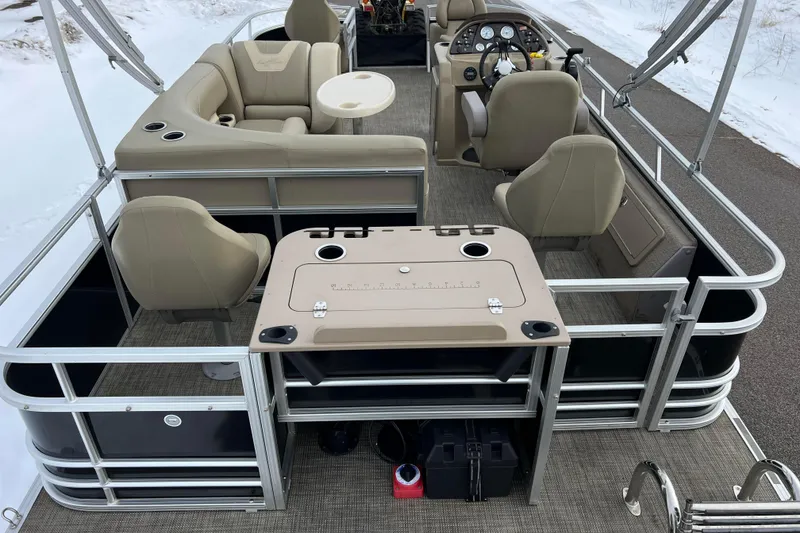 Slide: The Image of 2019 SunChaser Geneva Fish 20 Cnf pontoon boat with beige seating and fishing station. - 3