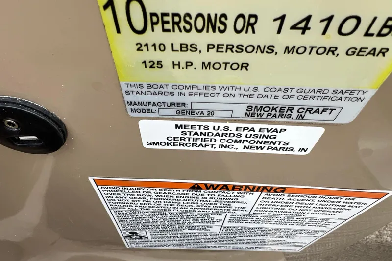 Slide: The Image of 2019 SunChaser Geneva Fish 20 Cnf boat capacity and safety labels, including U.S. Coast Guard compliance. - 31