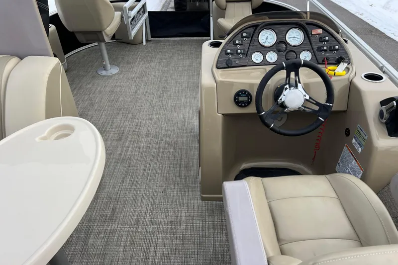 Slide: The Image of 2019 SunChaser Geneva Fish 20 Cnf boat interior with steering console and seating. - 42