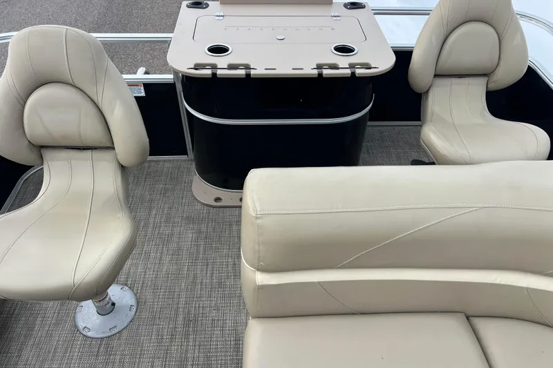 Slide: The Image of 2019 SunChaser Geneva Fish 20 Cnf boat interior with beige seating and fishing station. - 43