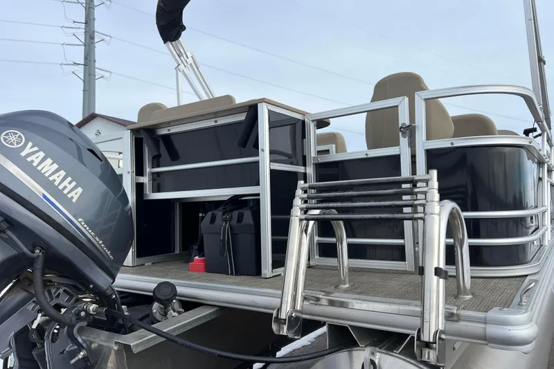 Slide: The Image of 2019 SunChaser Geneva Fish 20 Cnf pontoon boat with Yamaha outboard motor. - 5