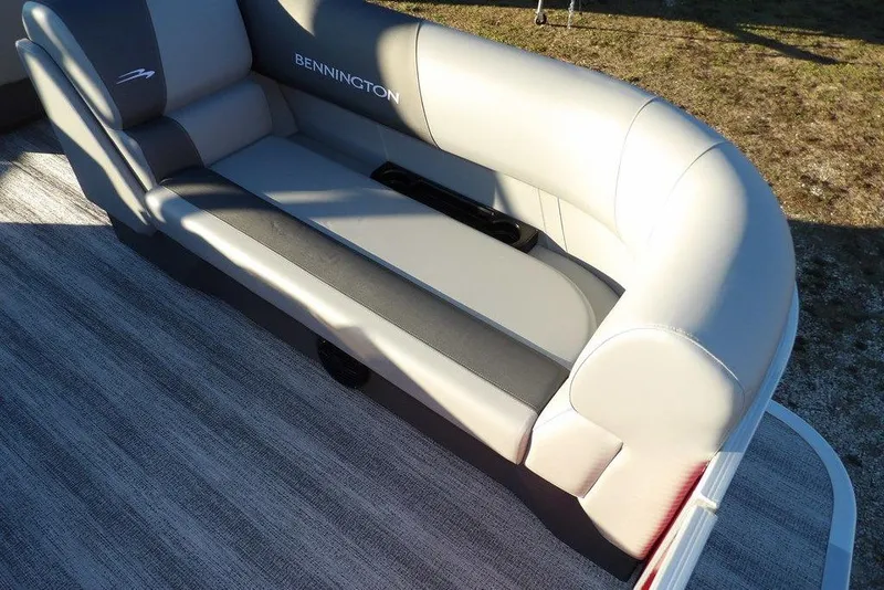 Slide: The Image of 2026 Bennington 21 S L-Bench boat seat, gray upholstery, outdoor setting. - 14