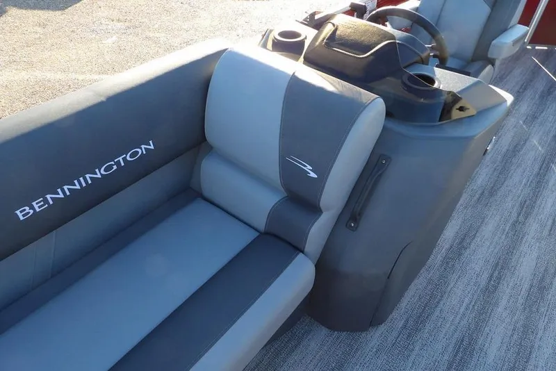 Slide: The Image of 2026 Bennington 21 S L-Bench boat interior with gray seating and console. - 17