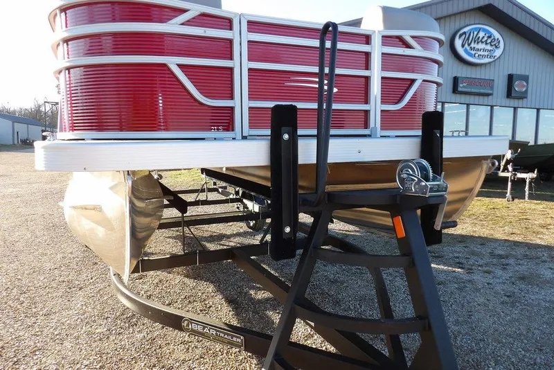 Slide: The Image of 2026 Bennington 21 S L-Bench pontoon boat on trailer at White's Marine Center. - 26