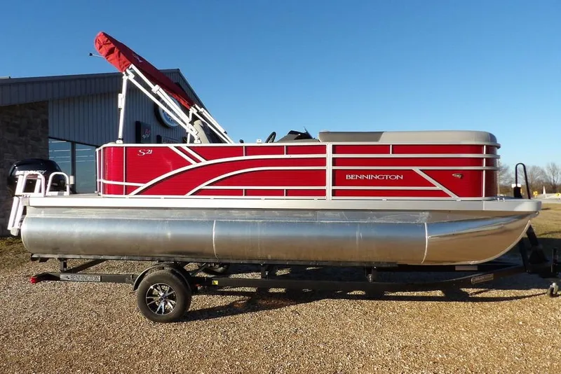 Slide: The Image of 2026 Bennington 21 S L-Bench pontoon boat on trailer. - 3