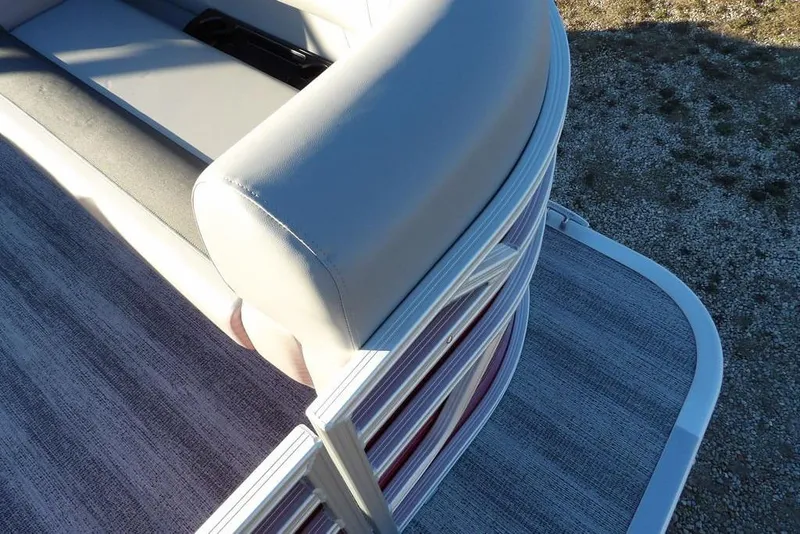 Slide: The Image of 2026 Bennington 21 S L-Bench pontoon boat with sleek seating and modern design. - 7