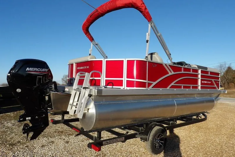 Slide: The Image of 2026 Bennington 21 S L-Bench pontoon boat with Mercury engine on trailer. - 8