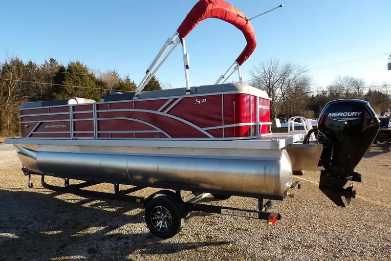 Slide: The Image of 2026 Bennington 21 S L-Bench pontoon boat with Mercury outboard motor on trailer. - 9