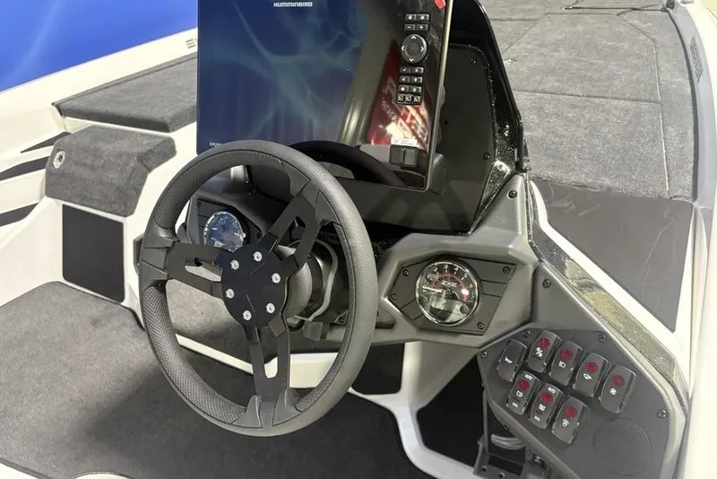 Slide: The Image of Steering console of 2026 Skeeter ZXE20 boat with advanced controls and display. - 15