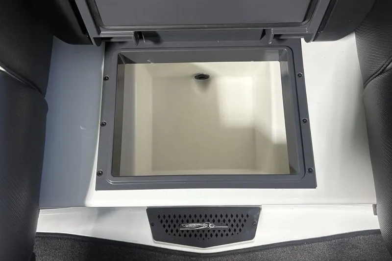 Slide: The Image of Open storage compartment in 2026 Skeeter ZXE20 boat interior. - 19