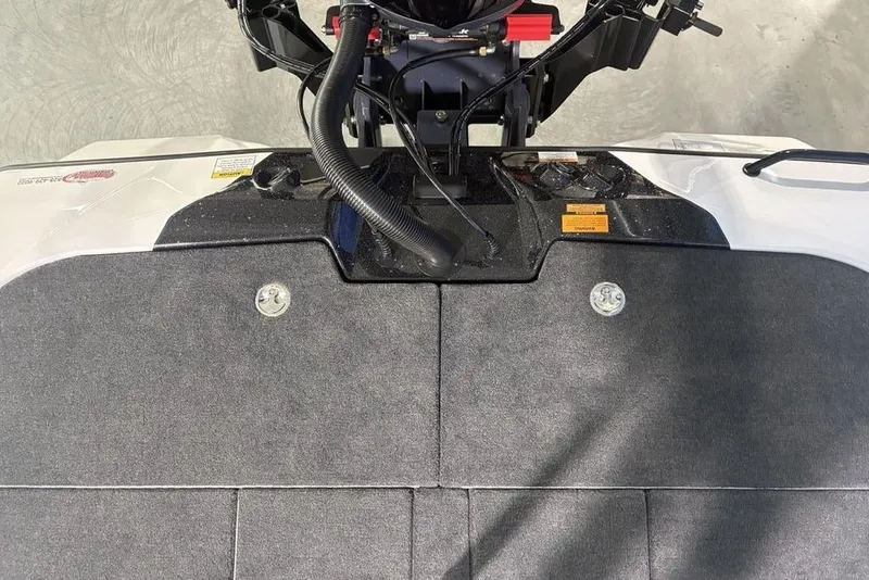 Slide: The Image of 2026 Skeeter ZXE20 boat deck with motor and control cables. - 21