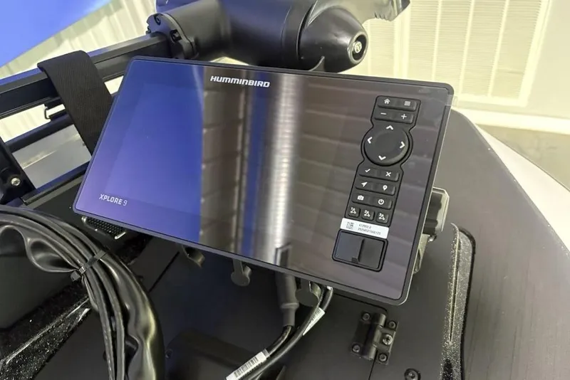 Slide: The Image of 2026 Skeeter ZXE20 boat with Humminbird Xplore 9 fish finder display. - 5