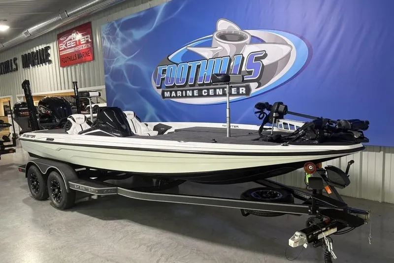 Slide: The Image of 2026 Skeeter ZXE20 boat displayed at Foothills Marine Center showroom. - 6