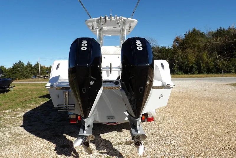 Slide: The Image of 2023 Front Runner 33 Center Console with dual 300 horsepower engines, rear view. - 5