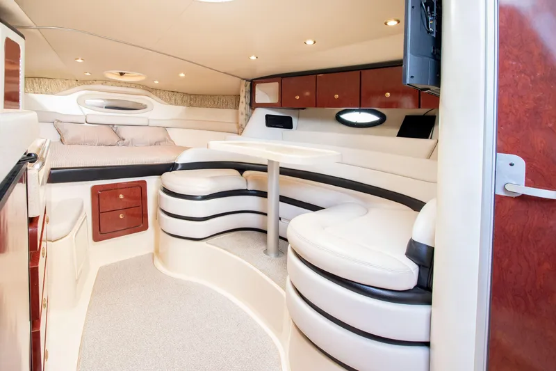 Slide: The Image of Interior of a 2002 Wellcraft 3300 Martinique yacht, luxurious and modern. - 11
