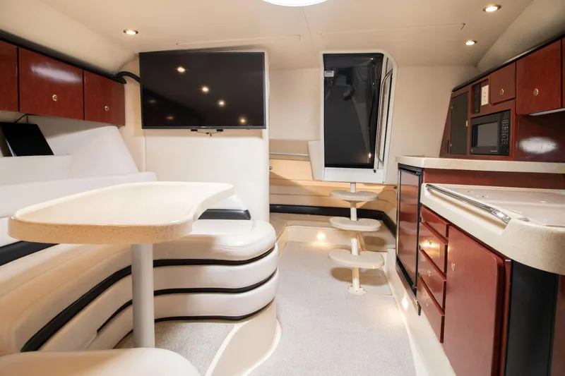 Slide: The Image of Interior of 2002 Wellcraft 3300 Martinique with modern amenities. - 12
