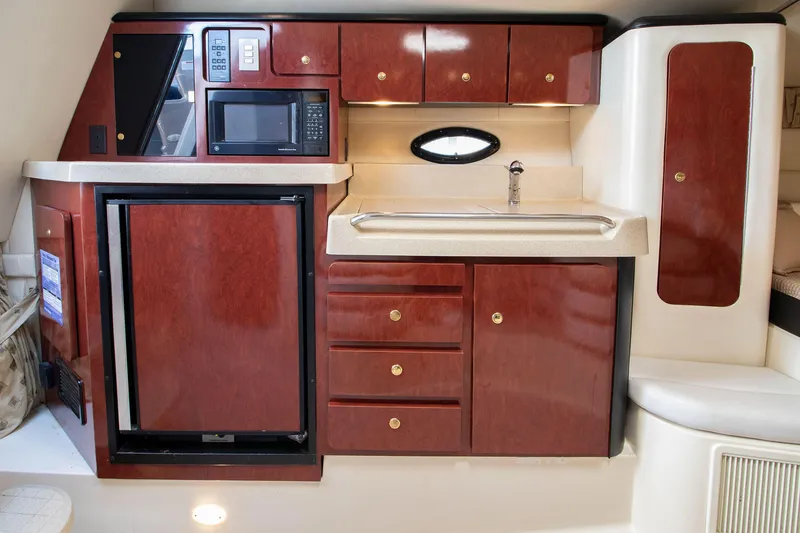 Slide: The Image of Galley in a 2002 Wellcraft 3300 Martinique yacht. - 9