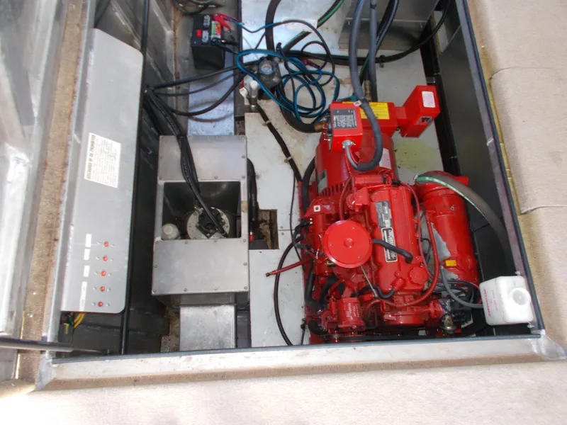 Slide: The Image of Engine compartment of a 2005 Sumerset Lake Bumz houseboat. - 49