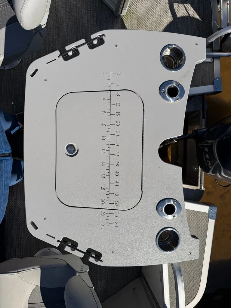 Slide: The Image of Bennington SX 22 boat table with cup holders and ruler, 2023 model. - 27