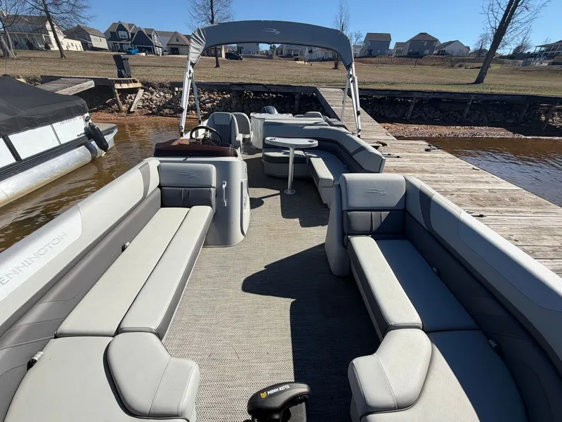 Slide: The Image of Interior of a 2023 Bennington SX 22 pontoon boat at dock. - 33