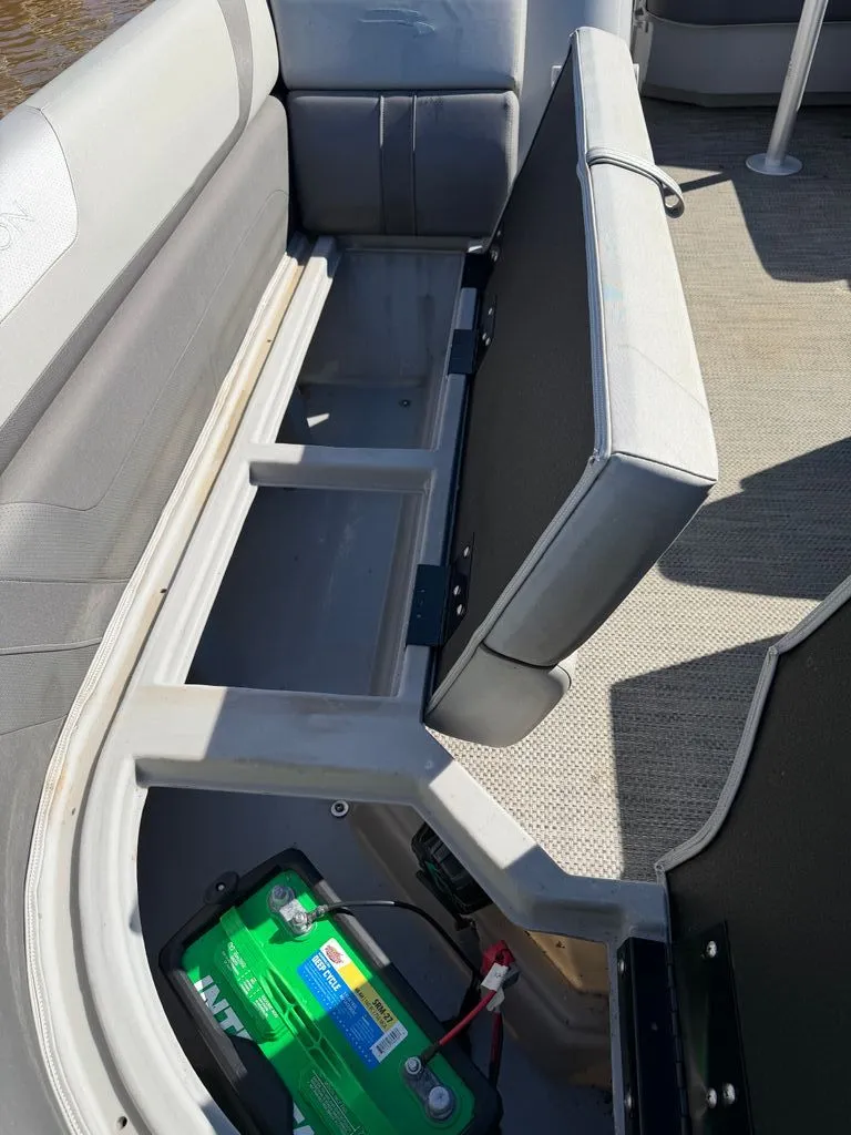 Slide: The Image of Interior of Bennington SX 22 boat with seating and battery. - 4