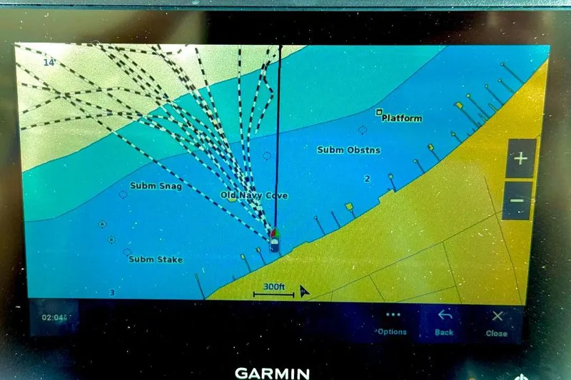 Slide: The Image of Garmin navigation display showing Old Navy Cove map on a Cobalt 302 boat. - 13