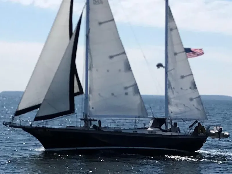 Slide: The Image of 1977 Fuji 45 MK II Ketch sailing on the sea. - 0