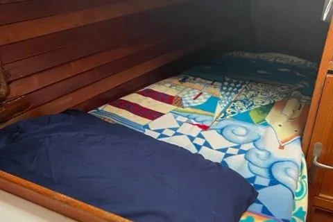 Slide: The Image of Interior of 1977 Fuji 45 MK II Ketch with cozy bed. - 11