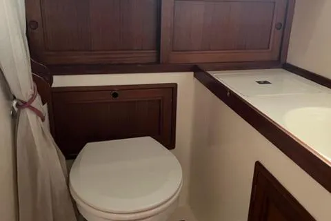 Slide: The Image of 1977 Fuji 45 MK II Ketch interior with toilet. - 15